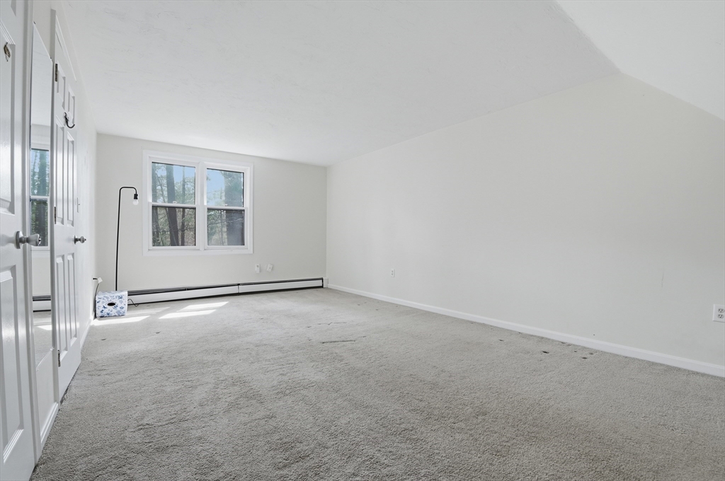 30 Packet Landing, Unit A Pembroke, MA 02359 - Photo 20 of 32 an empty room with windows and closet
