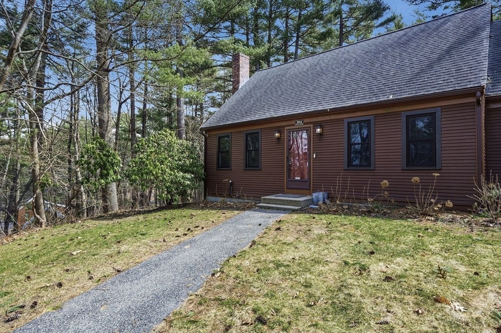 30 Packet Landing, Unit A Pembroke, MA 02359 - Photo 2 of 32 a view of house with yard
