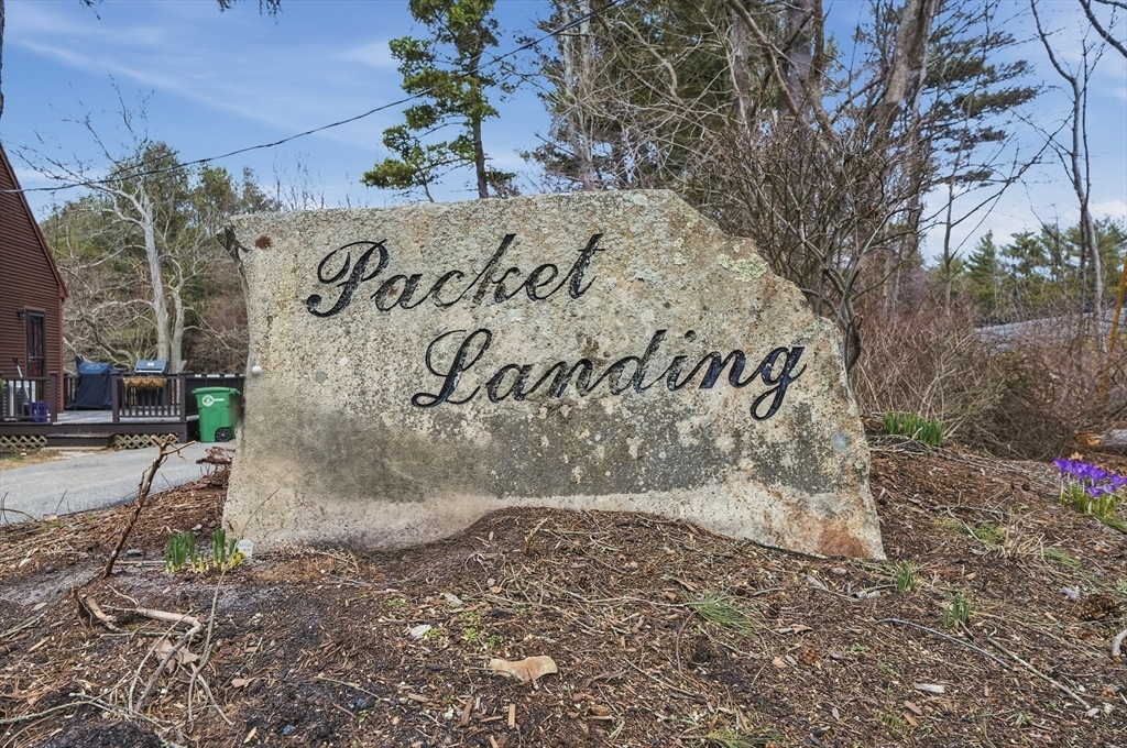 30 Packet Landing, Unit A Pembroke, MA 02359 - Photo 32 of 32 a view of outdoor space with sign board