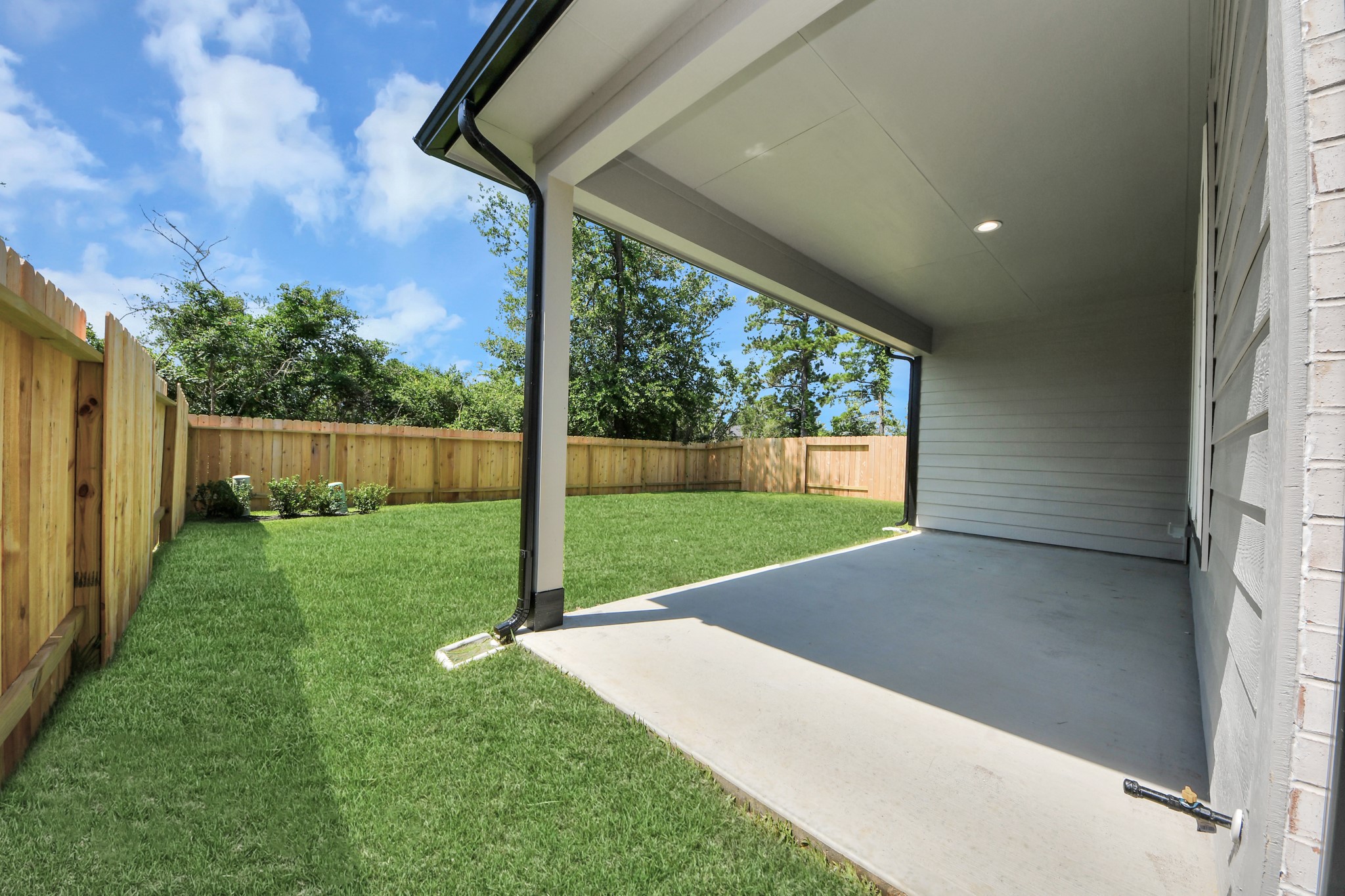 2926 Bury Park Dr Spring Spring, TX 77373 - Photo 38 of 40 Come and see this spacious backyard with its beautiful covered patio. There is plenty of room for the kids to play and adults to relax. Perfect for your outdoor living space, patio furniture, bbq pit, and so much more. The possibilities are endless!