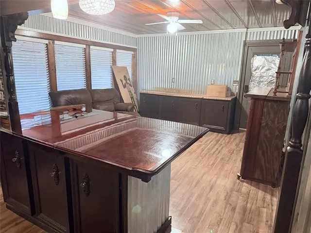 a bathroom with a sink a vanity and a mirror