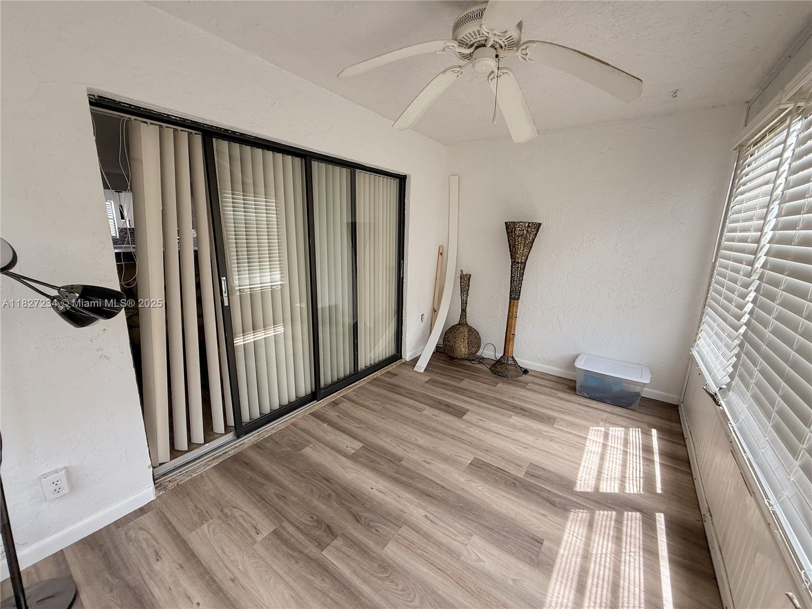9355 Southwest 8th Street, Unit 402 Boca Raton, FL 33428 - Photo 18 of 29 a view of a hallway view with staircase