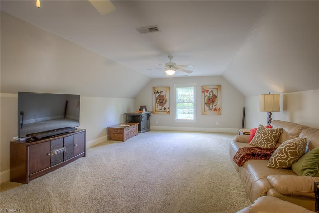 5924 Tarleton Drive Oak Ridge, NC 27310 - Photo 22 of 30 The bonus room is on the second level.