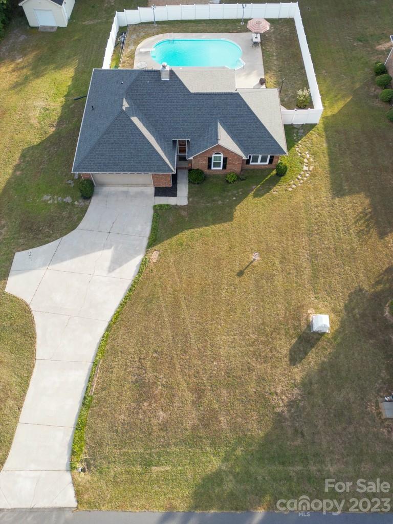 268 Robert Keever Road Stanley, NC 28164 - Photo 9 of 11 a aerial view of a house with swimming pool