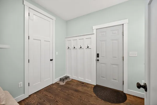 a en suite bathroom with double sink and a mirror
