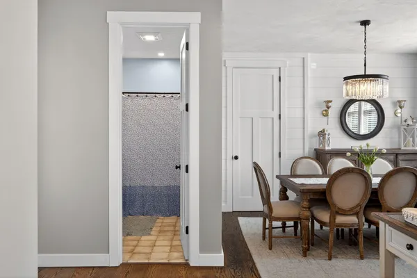 a kitchen with stainless steel appliances granite countertop a refrigerator a stove top oven a sink and dishwasher