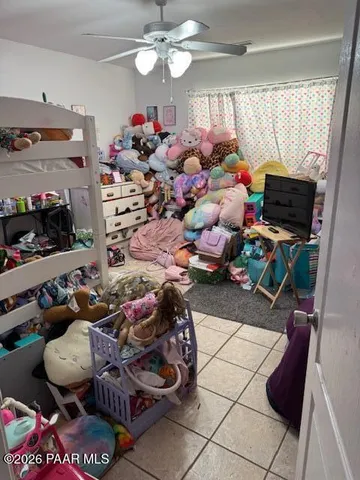 a room with furniture and a flat screen tv