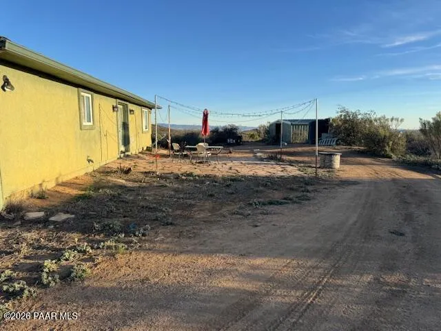 a view of a backyard of a house