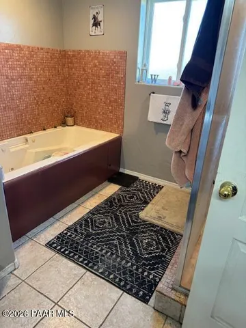 a bath room with a rug