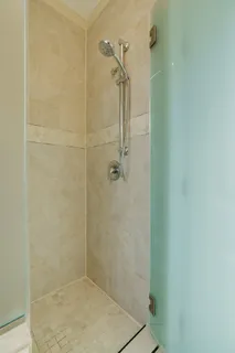 a view of hallway with wooden floor