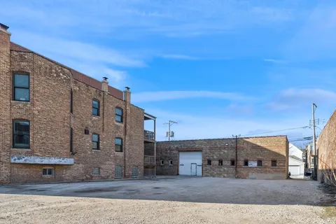 a view of a big room with large windows
