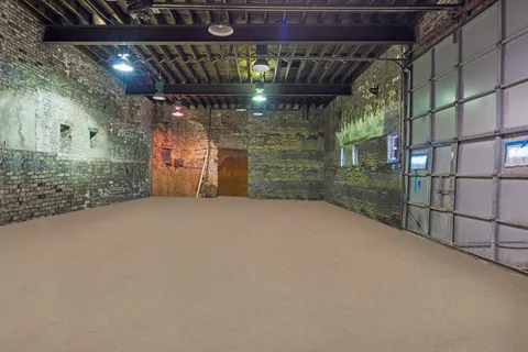 a aerial view of multi story residential apartment building