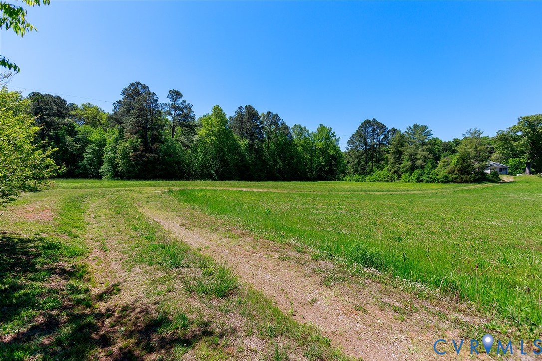 9903 Boze Road Ford, VA 23850 - Photo 42 of 45 a view of a grassy field with trees in the background