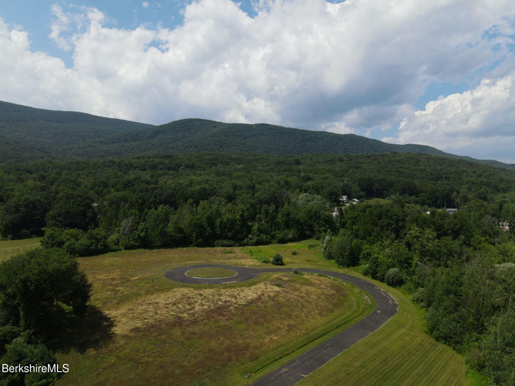 Lot 9 West Maple Street Adams, MA 01220 - Photo 1 of 9 a view of a big yard with lots of green space