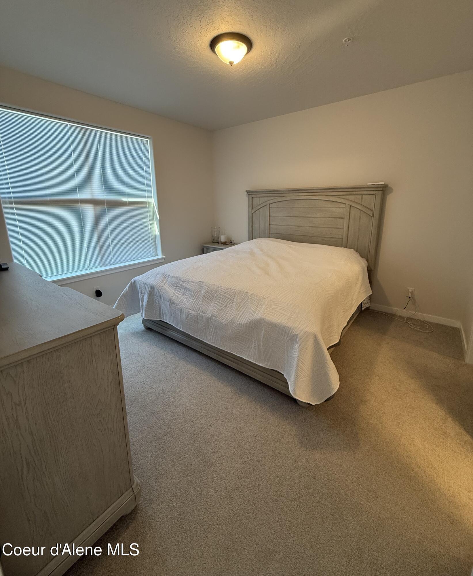 6480 North Atlas Road, Unit 203 Coeur D'Alene, ID 83815 - Photo 3 of 6 Primary Bedroom (1)