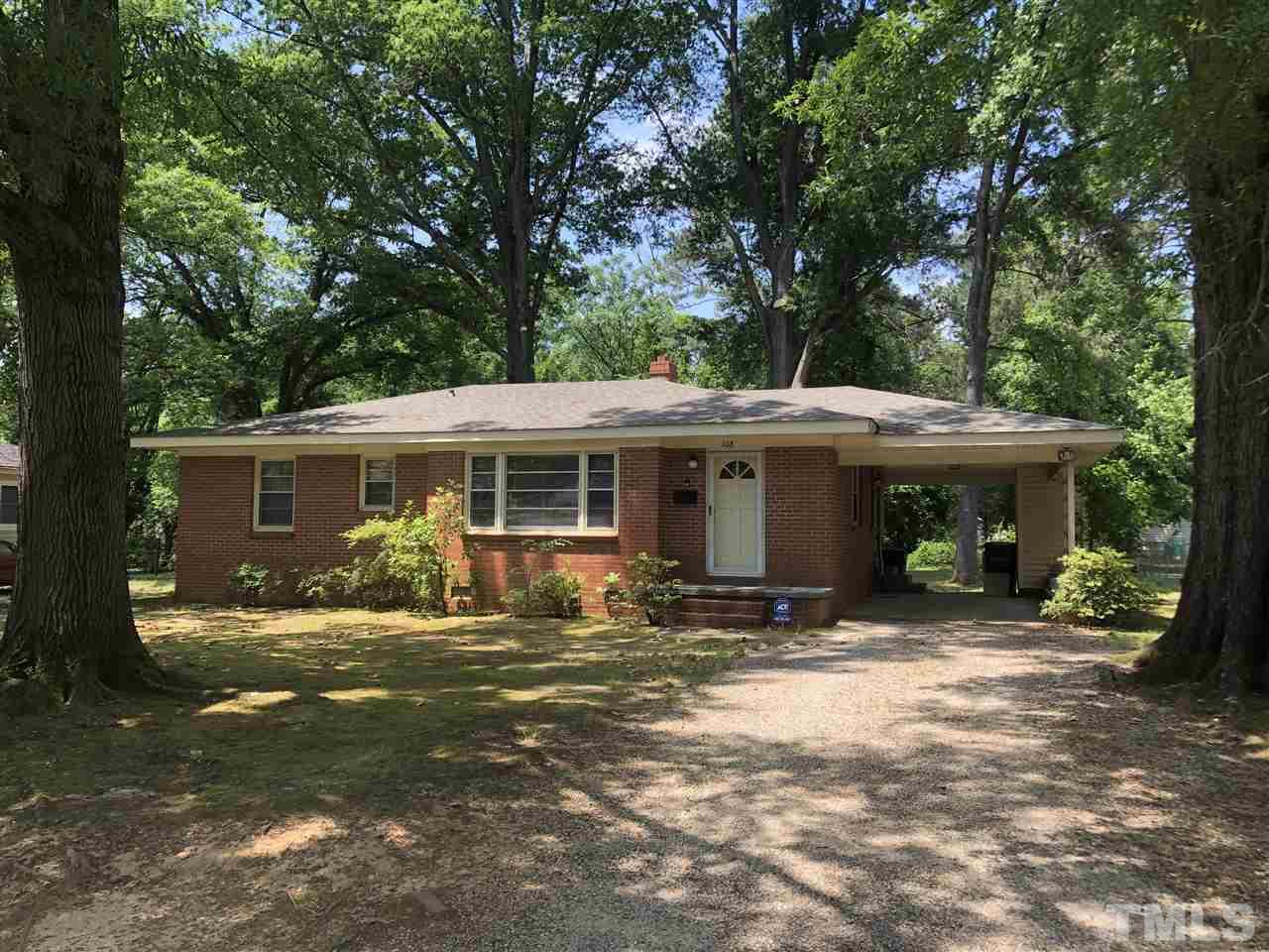 308 Shellum Street Raleigh, NC 27610 - Photo 1 of 16 a view of a house with backyard