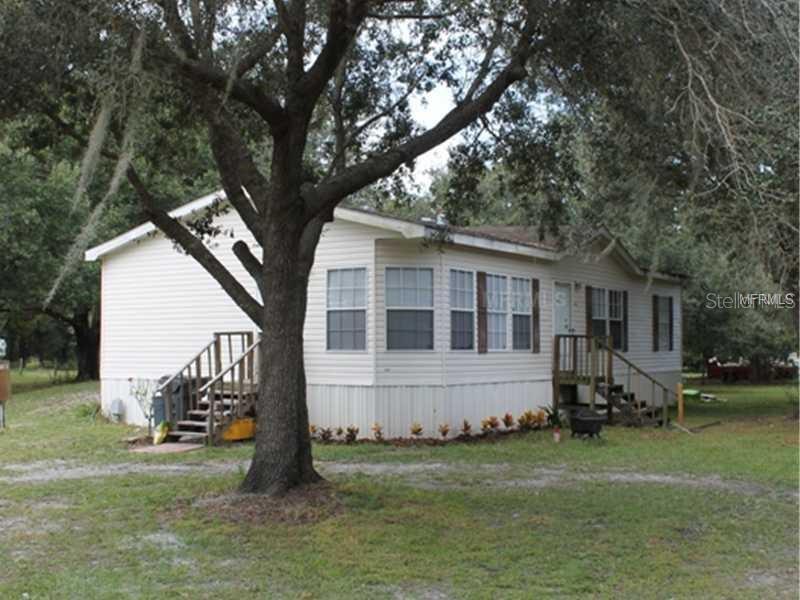 4505 Old Government Road Lakeland, FL 33811 - Photo 1 of 1 a view of a house with backyard
