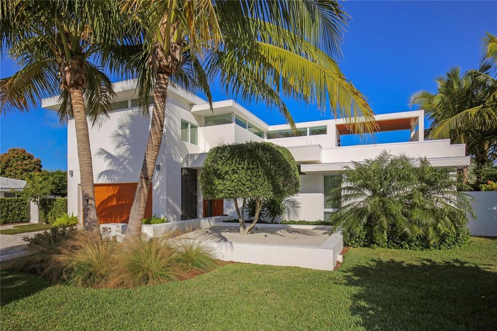 593 Rountree Drive Longboat Key, FL 34228 - Photo 1 of 1 Contemporary waterfront oasis - stunning architectural design by Seibert Architects & Johnathan Parks.