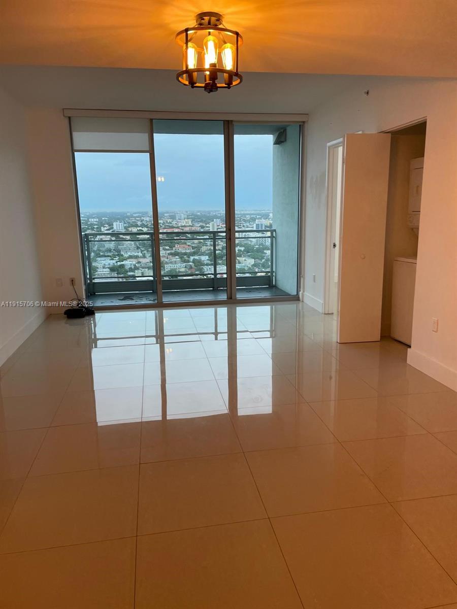 92 Southwest 3rd Street, Unit 3309 Miami, FL 33130 - Photo 3 of 7 a view of a room with a large window