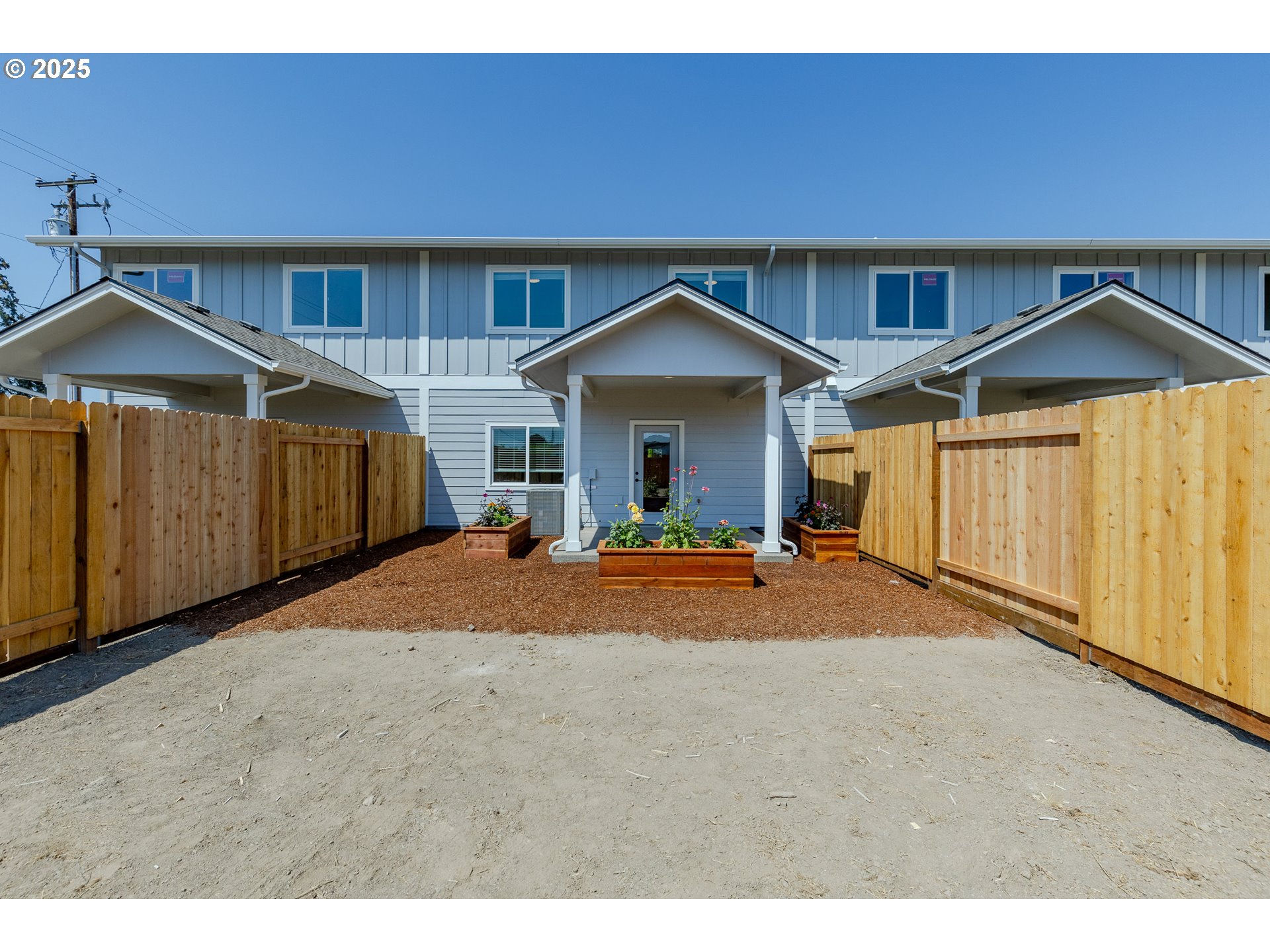 729 Periander Way Harrisburg, OR 97446 - Photo 21 of 24 a house view with a garden space