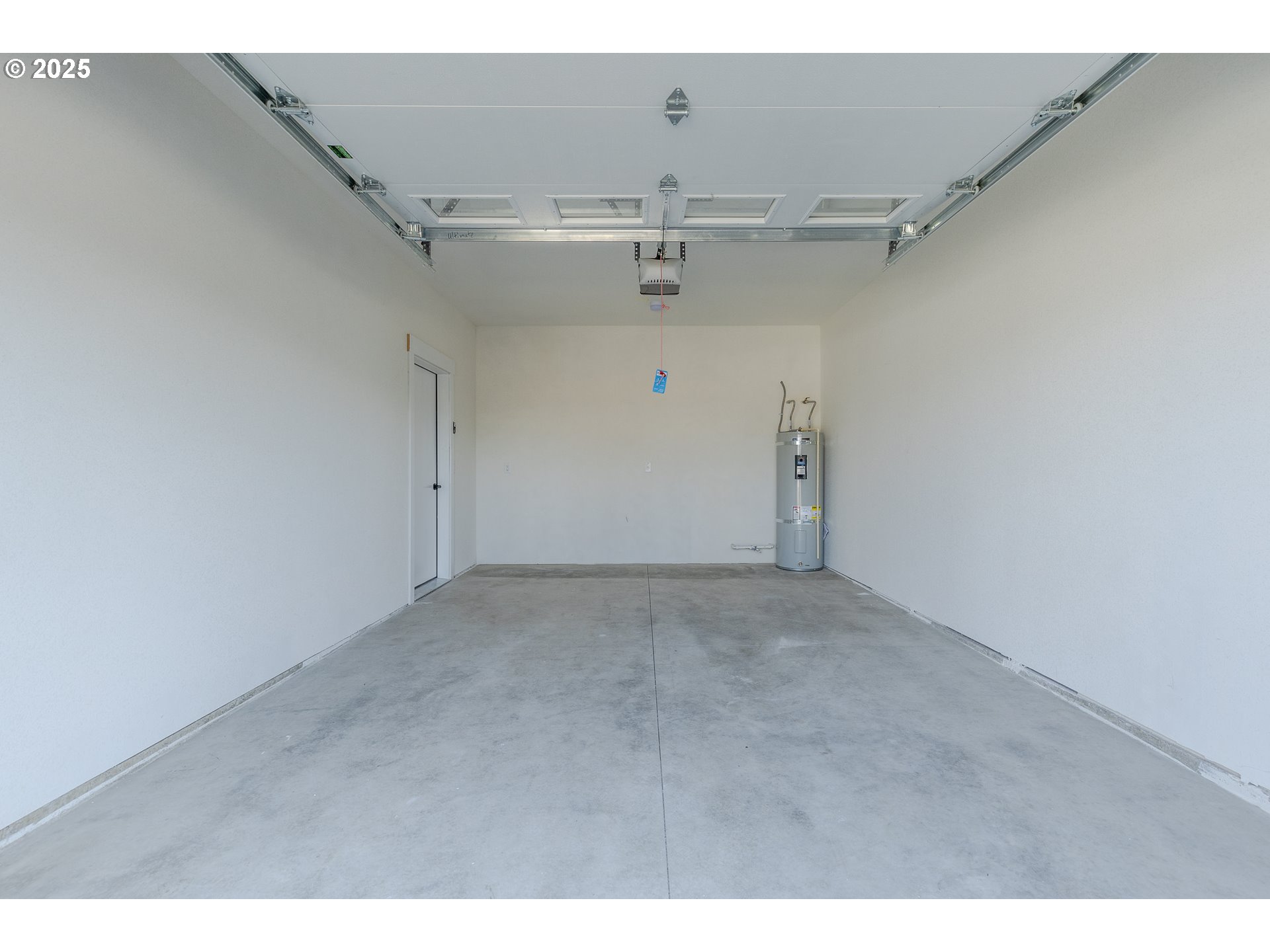 729 Periander Way Harrisburg, OR 97446 - Photo 23 of 24 a view of a garage