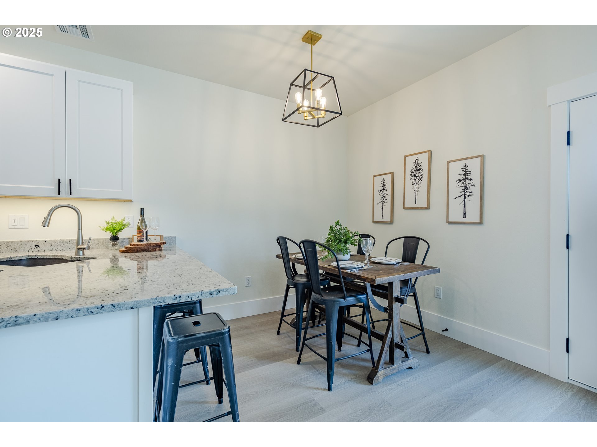 729 Periander Way Harrisburg, OR 97446 - Photo 9 of 24 a view of a dining room with furniture