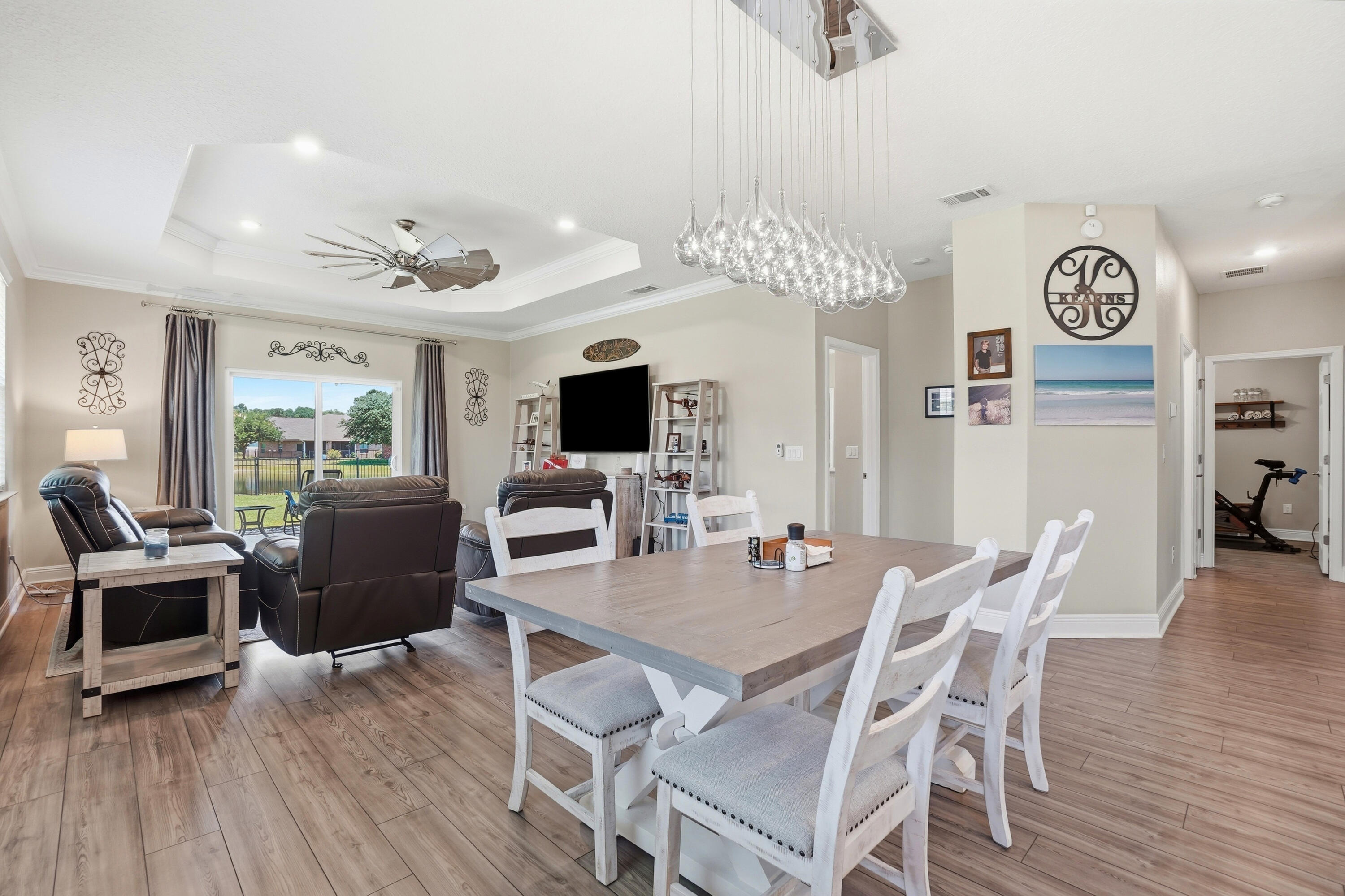 525 Windchime Way Freeport, FL 32439 - Photo 12 of 59 a view of a dining room with furniture window and wooden floor