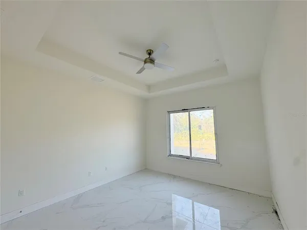 a bathroom with a shower and a sink