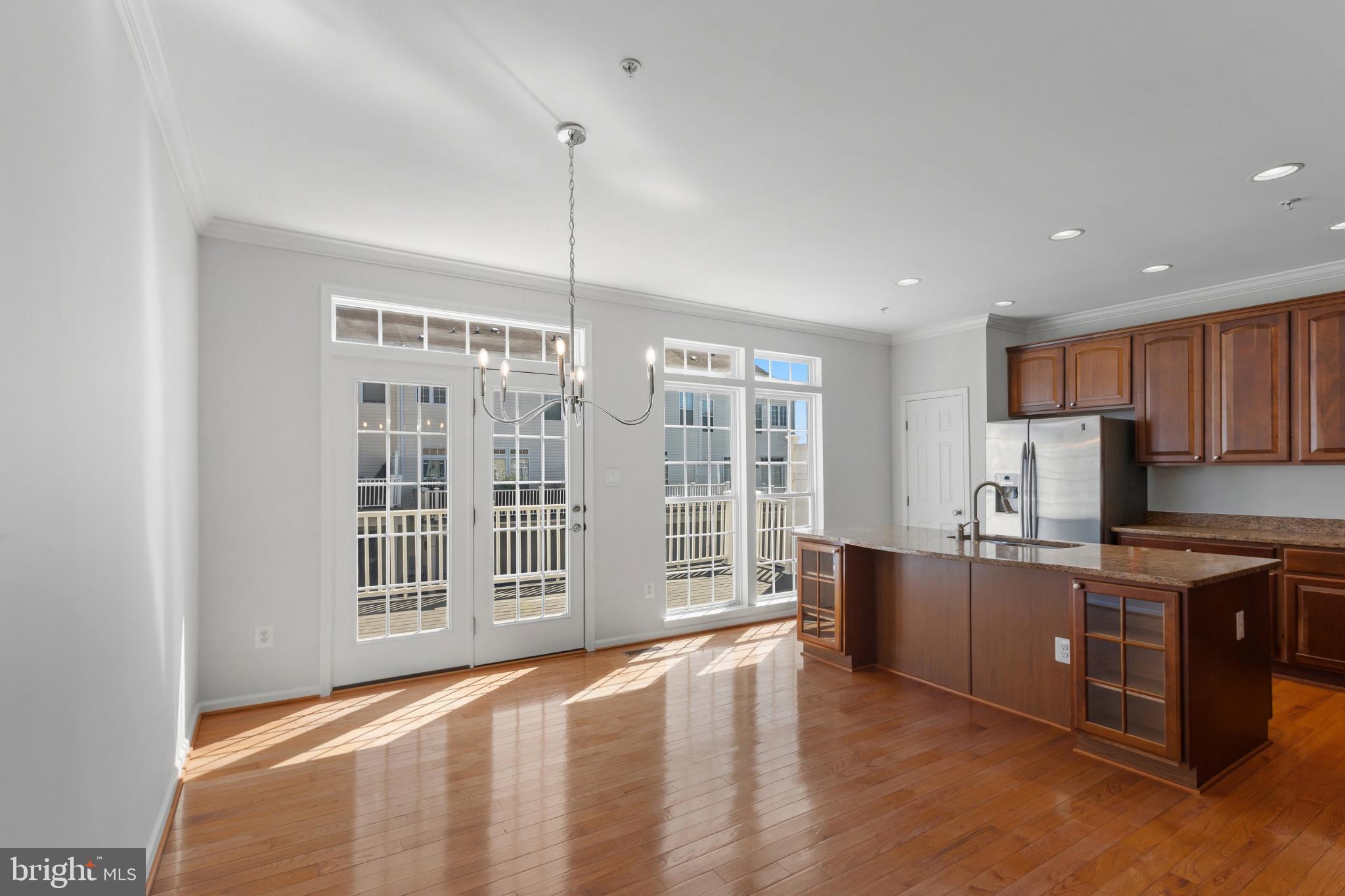 1729 Theale Way Hanover, MD 21076 - Photo 23 of 56 Dining Room with Deck Access