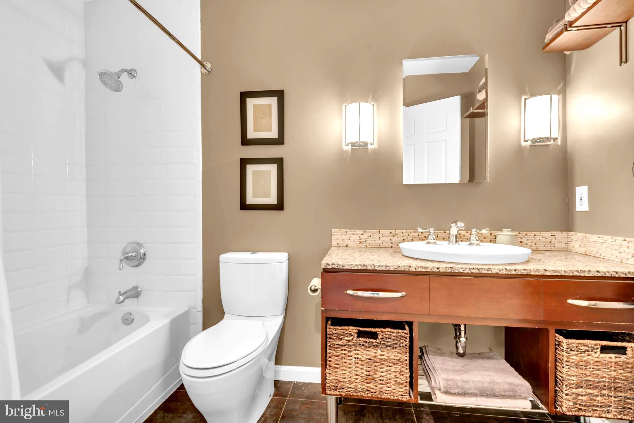 1870 Poplar Road Annapolis, MD 21401 - Photo 20 of 51 Hall bath with pretty porcelain tile.