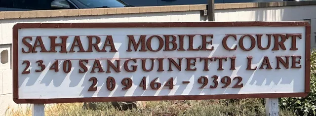 a view of a wooden sign