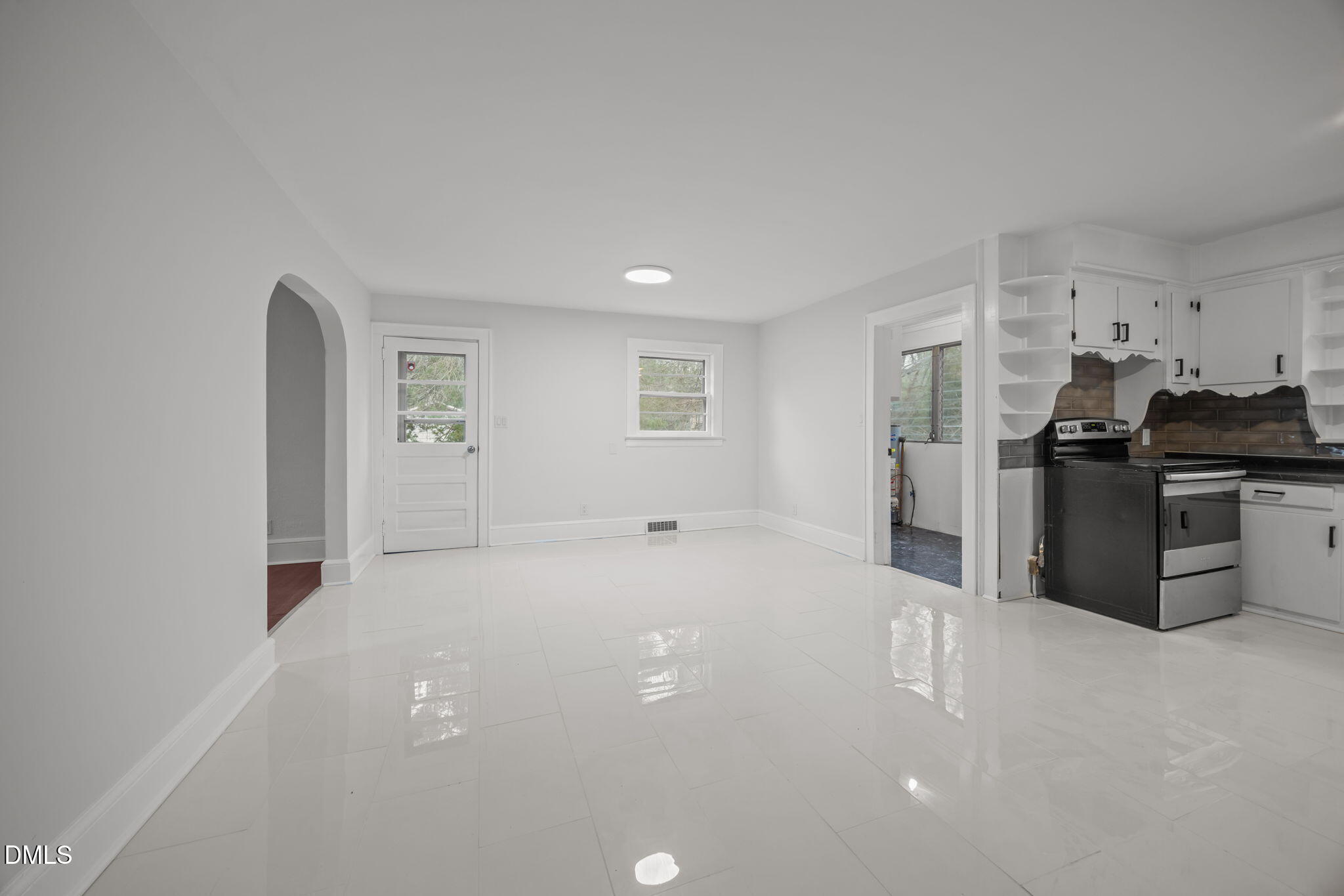 1811 Lazy Lane High Point, NC 27265 - Photo 13 of 44 a view of a kitchen with refrigerator stove and windows