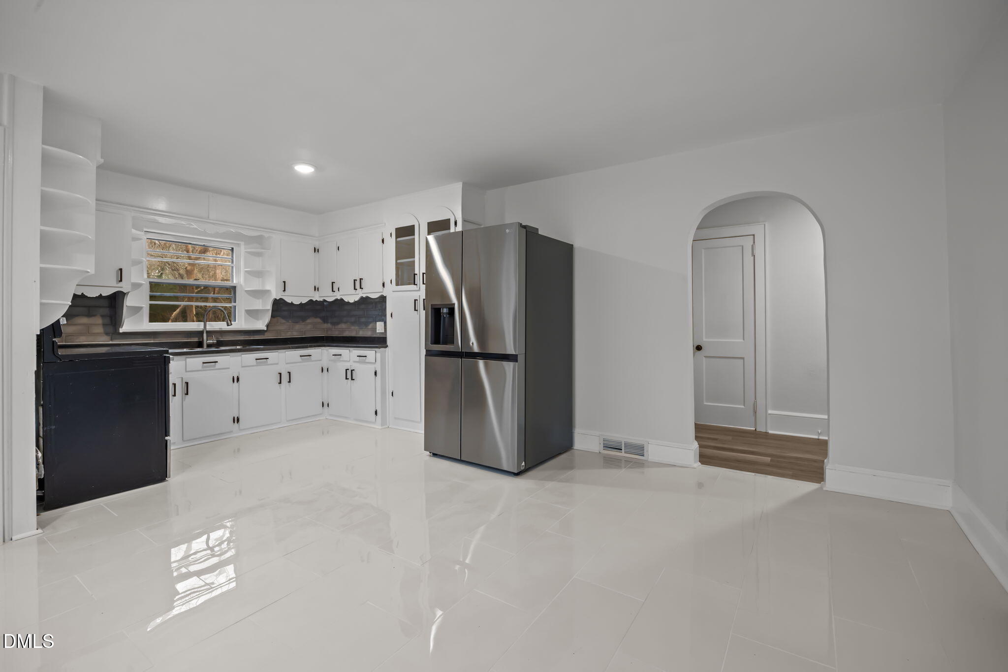 1811 Lazy Lane High Point, NC 27265 - Photo 14 of 44 a kitchen with stainless steel appliances granite countertop a refrigerator and a sink