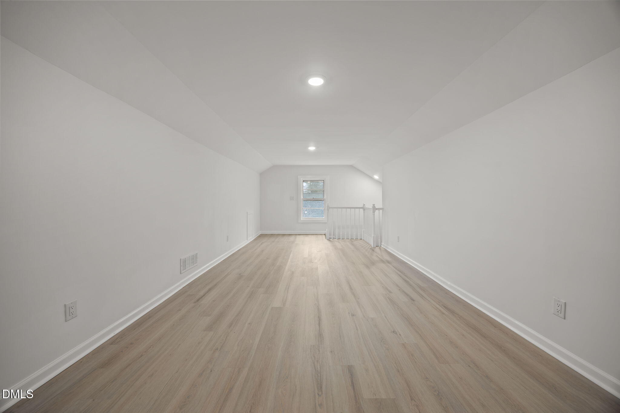 1811 Lazy Lane High Point, NC 27265 - Photo 18 of 44 a view of empty room with wooden floor and stove