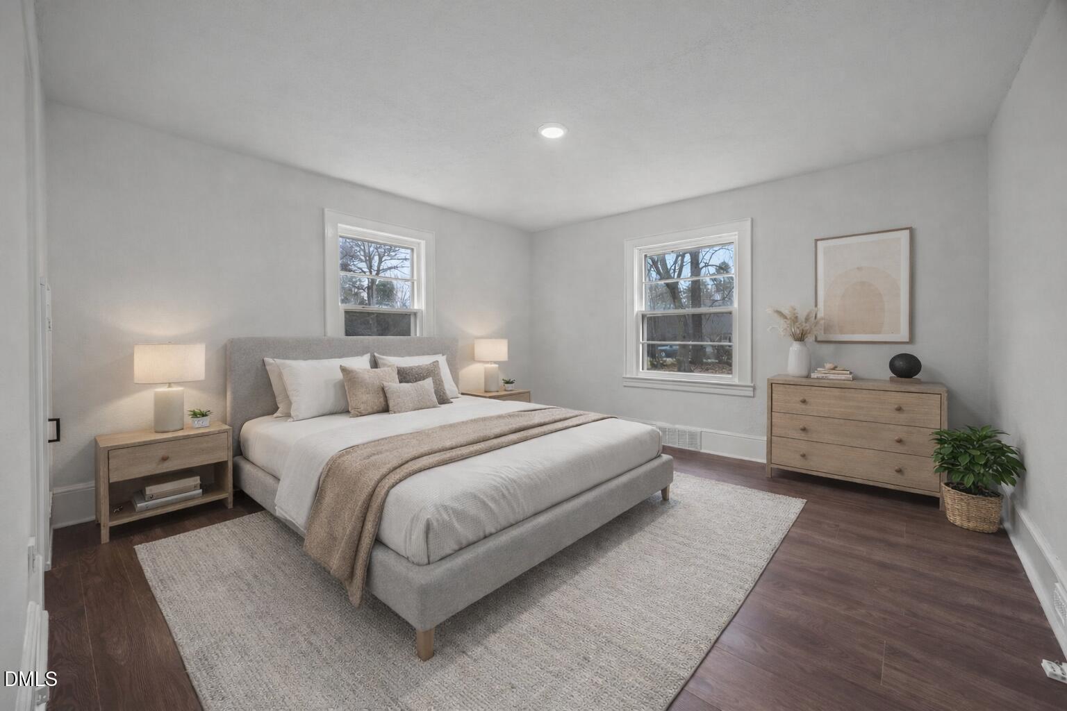 1811 Lazy Lane High Point, NC 27265 - Photo 22 of 44 a spacious bedroom with a bed a dresser and next to a window