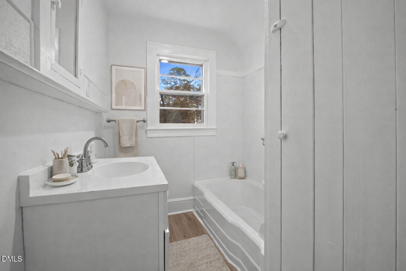 1811 Lazy Lane High Point, NC 27265 - Photo 24 of 44 a bathroom with a sink a bathtub and a window