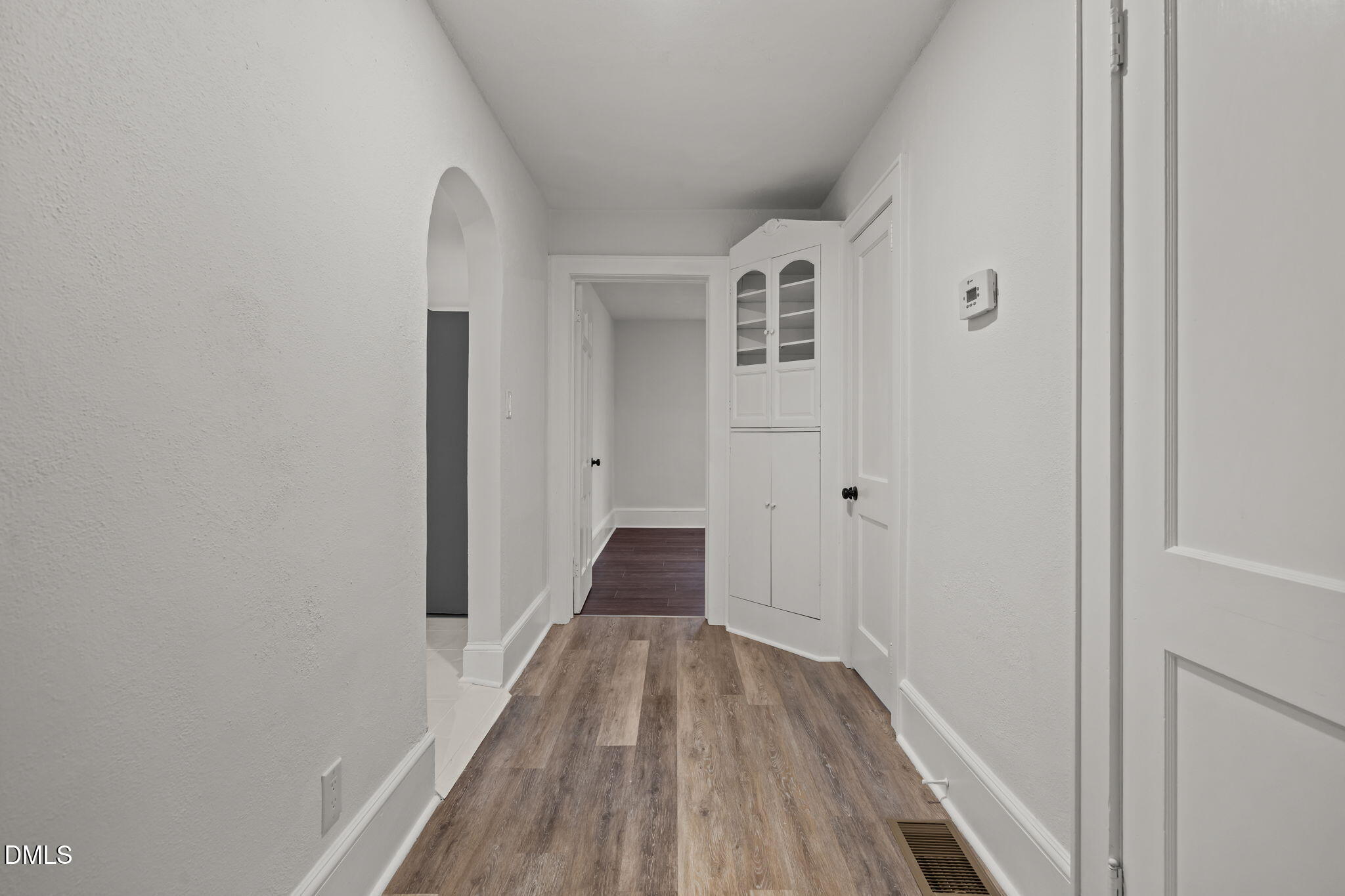 1811 Lazy Lane High Point, NC 27265 - Photo 25 of 44 a view of a hallway with wooden floor