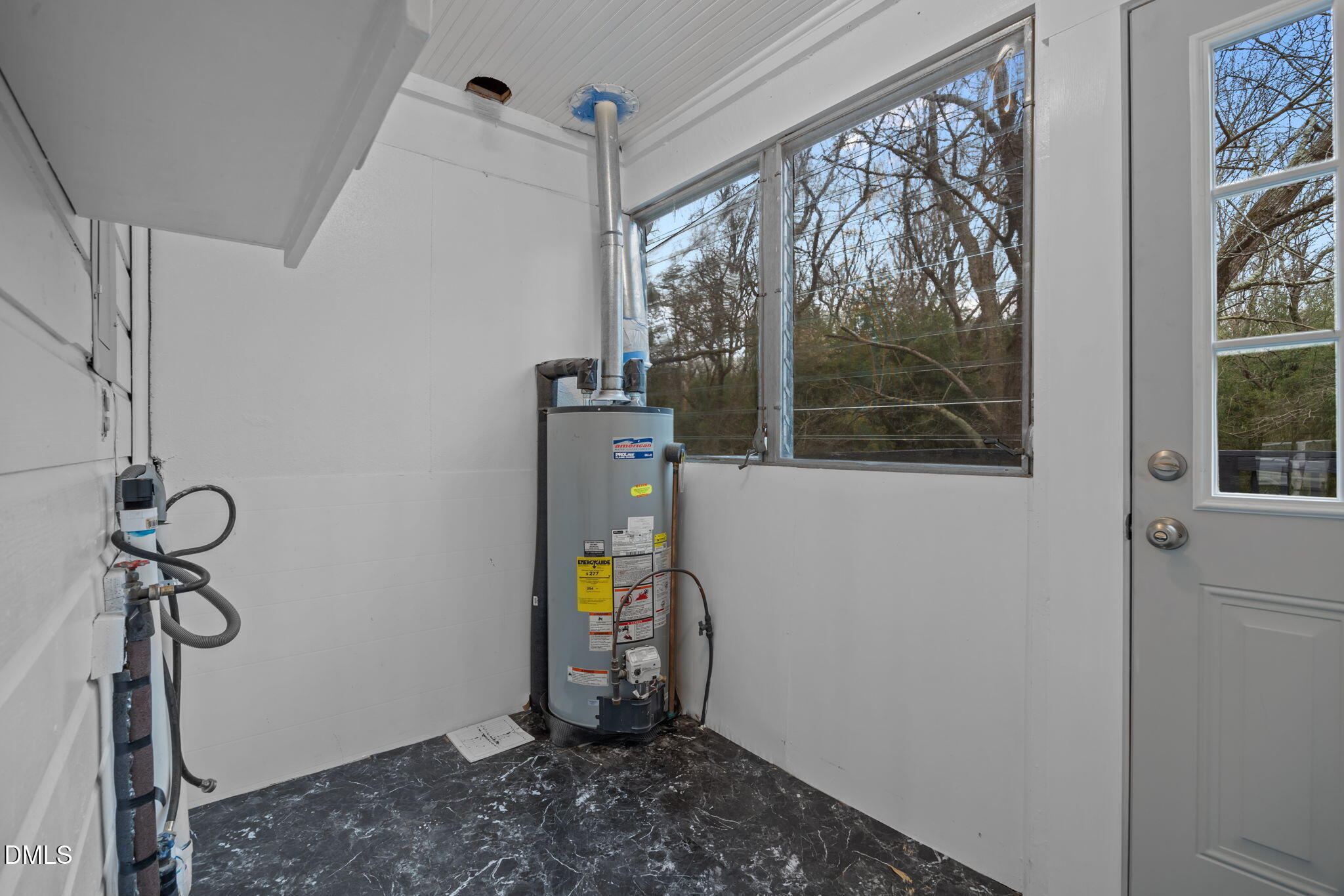 1811 Lazy Lane High Point, NC 27265 - Photo 27 of 44 a view of storage and utility room with a window