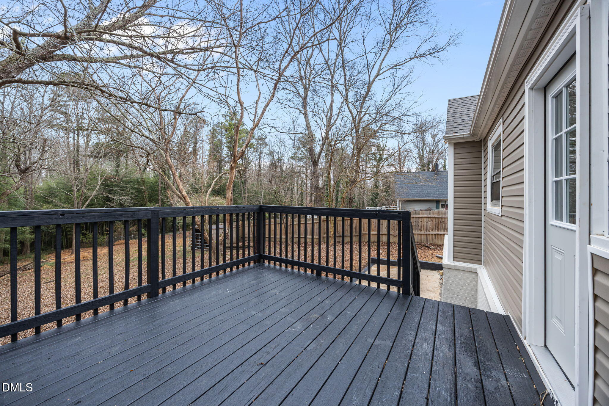 1811 Lazy Lane High Point, NC 27265 - Photo 28 of 44 a balcony with wooden floor and trees