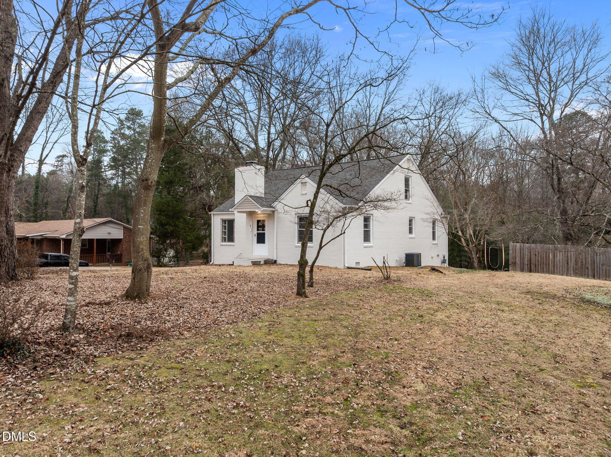 1811 Lazy Lane High Point, NC 27265 - Photo 43 of 44 a white house that has a tree in front of it