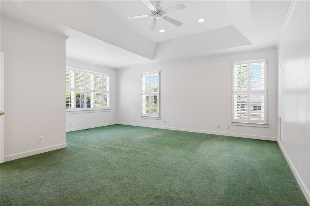 110 Garden Gate Drive Anderson, SC 29621 - Photo 18 of 35 This spacious bedroom offers ample natural light and a comfortable setting for relaxation.