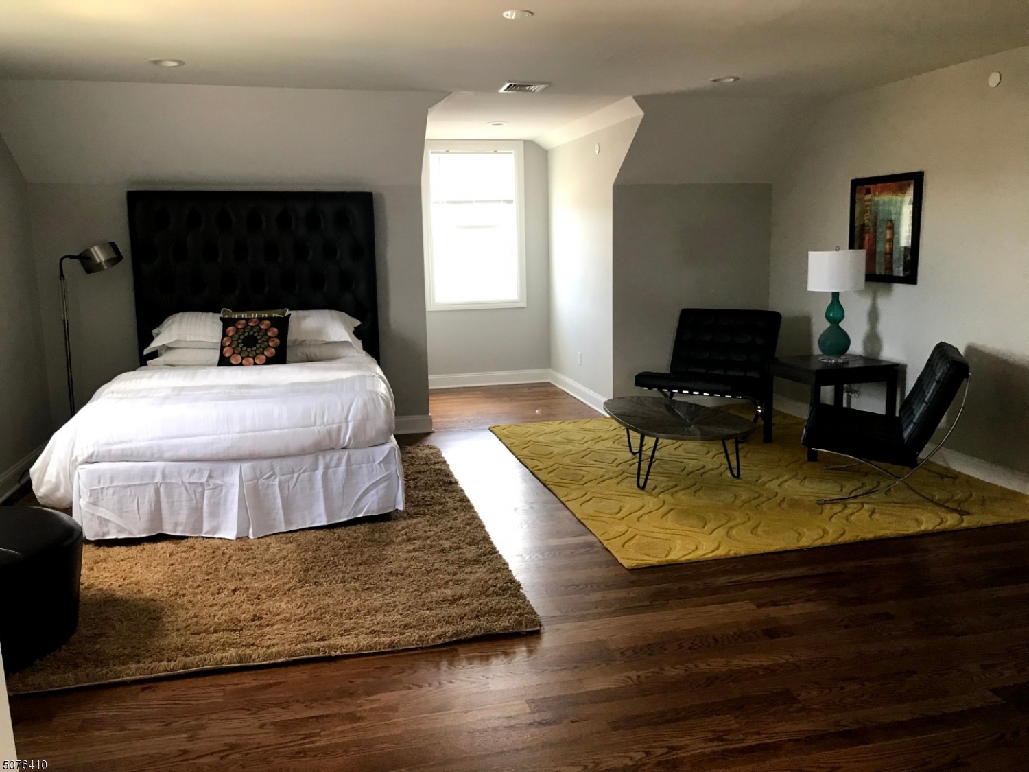 569 Springfield Avenue, Unit 5 Berkeley Heights, NJ 07922 - Photo 11 of 12 a bedroom with a bed and window