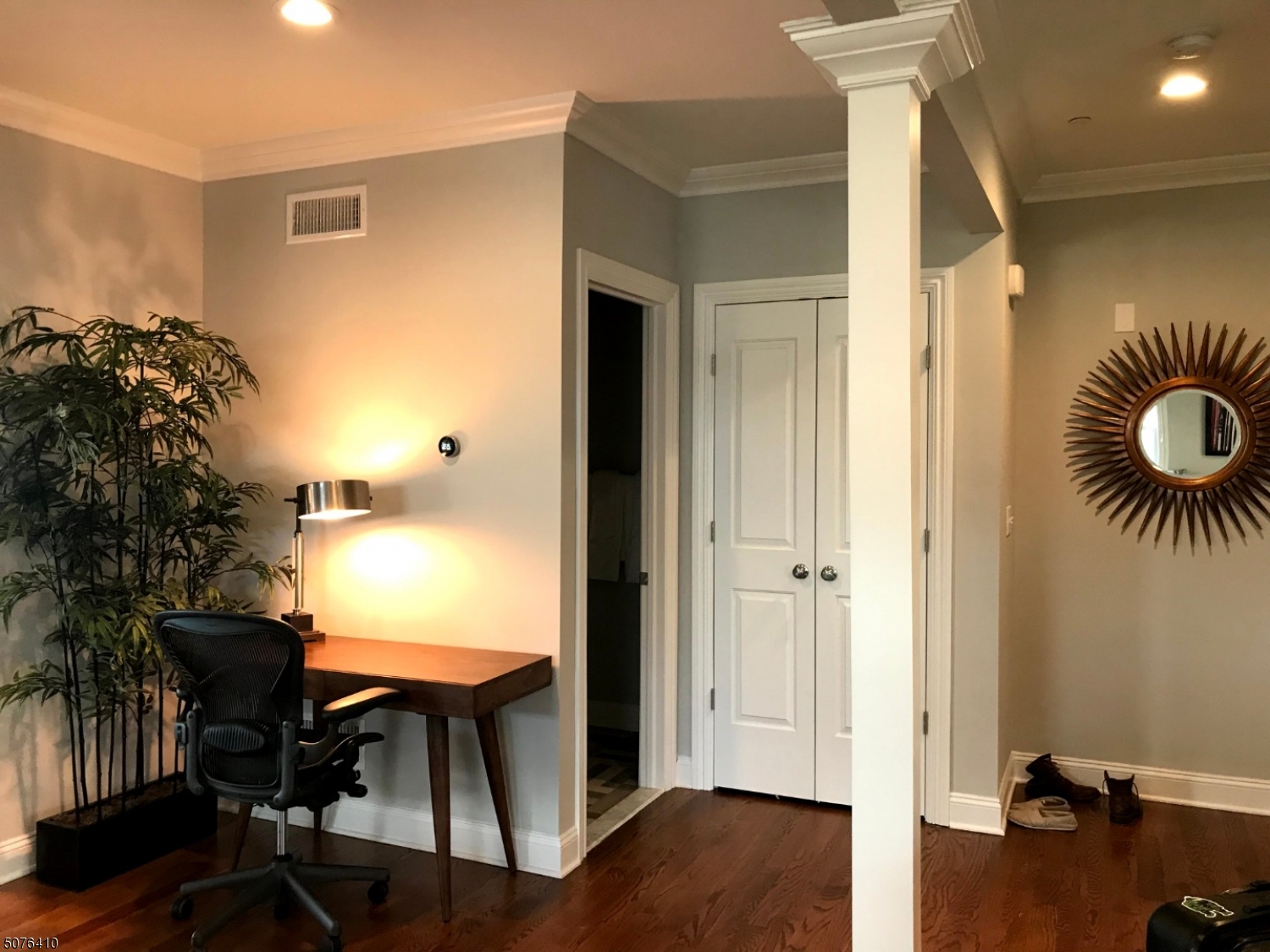 569 Springfield Avenue, Unit 5 Berkeley Heights, NJ 07922 - Photo 5 of 12 a view of a livingroom with furniture and wooden floor