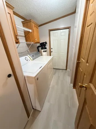 a view of utility room with washer and dryer