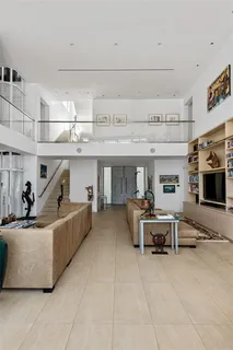 a bathroom with a tub and a sink