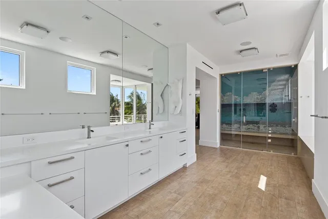 a view of roof deck with two chairs and a table