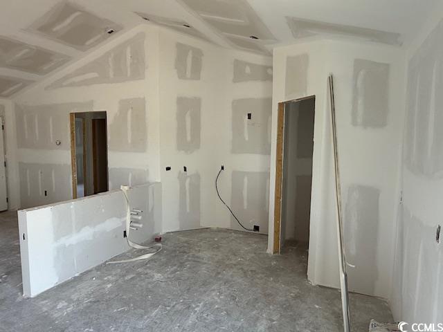 6692 Joyner Swamp Road Aynor, SC 29511 - Photo 5 of 16 Spare room with lofted ceiling and electric panel