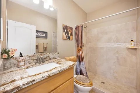 a view of a golf course with a lake