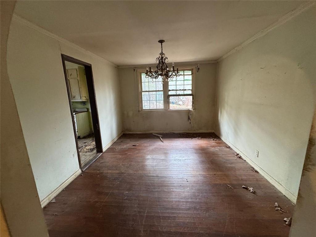 1096 3rd Street Northwest Atlanta, GA 30318 - Photo 11 of 17 en empty room with windows and hardwood floor