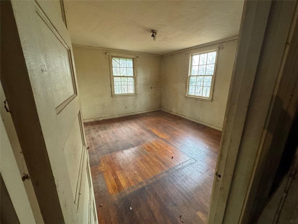 1096 3rd Street Northwest Atlanta, GA 30318 - Photo 15 of 17 a view of livingroom with hardwood and window